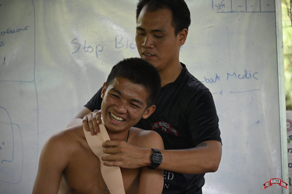 Karenni Ranger medic leads training on Tactical Combat Casualty Care.