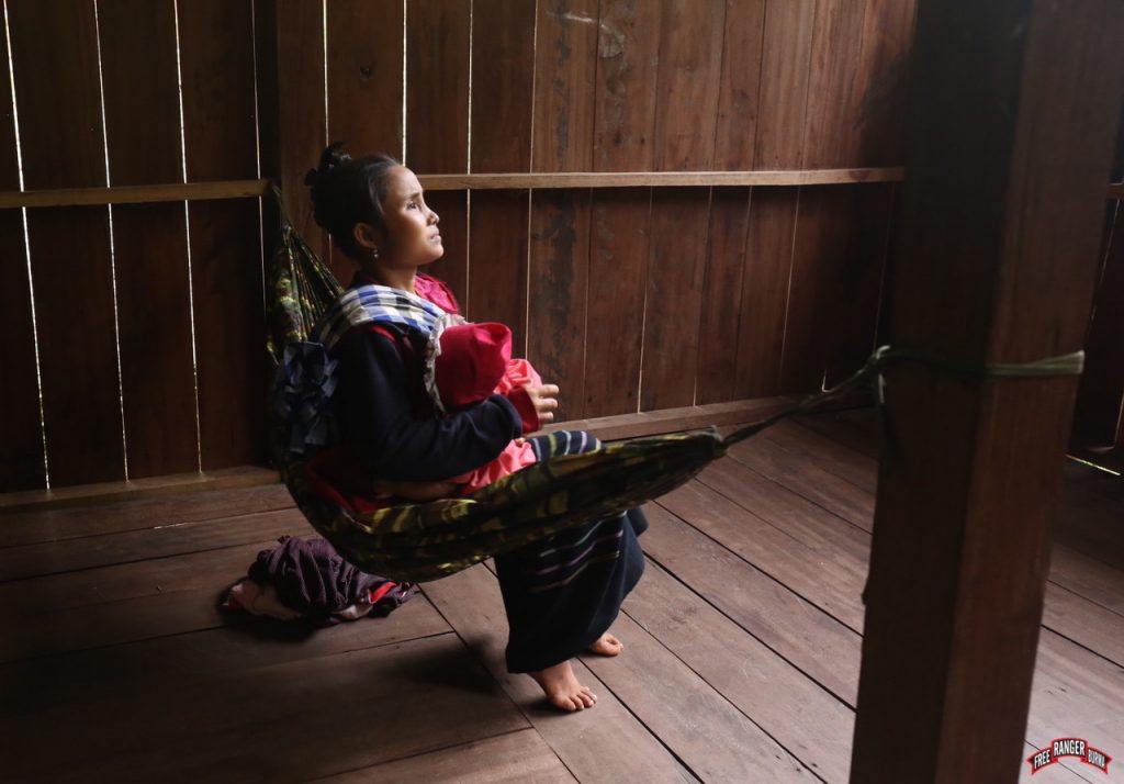 Saw Kit Mae's wife and child at our clinic while he is being treated.