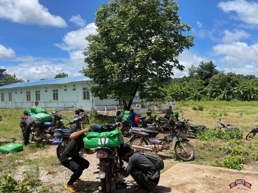 FBR team distributes tarps to IDPs. 