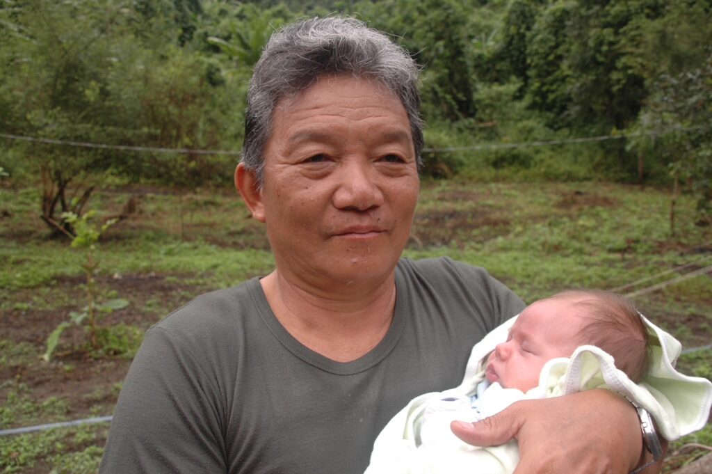 Old Original Ranger with newest Ranger, Peter, at three weeks old in Burma.