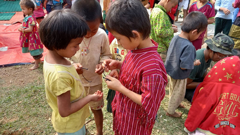 Children getting ready to assemble to GLC bracelet each bead has a different color and meaning. 