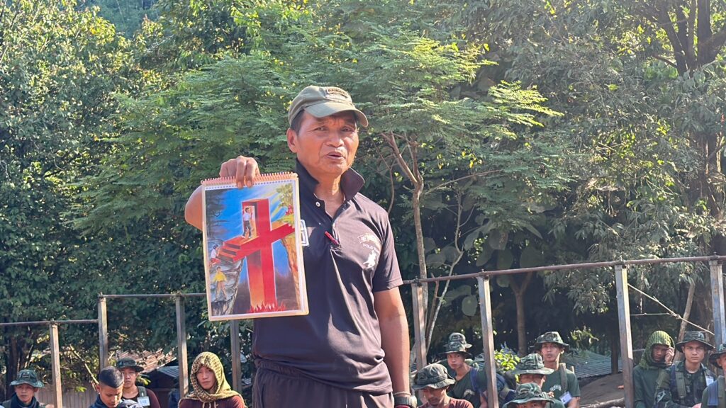 Senior instructor presents the Gospel.