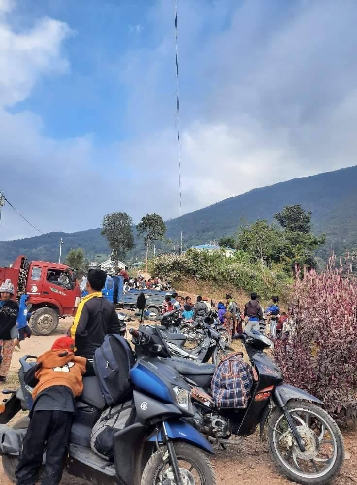 Above: people fleeing their homes.