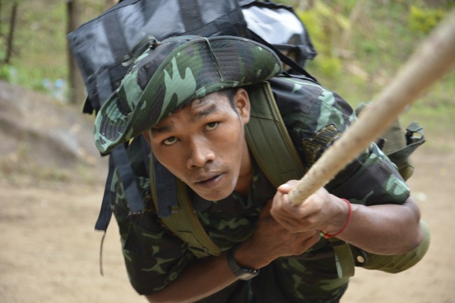 Nay Tho crossing the rope bridge during his FBR training.
