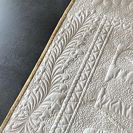 free-motion quilting leafy feather pattern