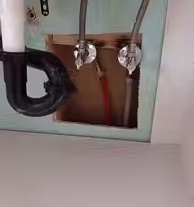 Under sink plumbing exposed during repipe project