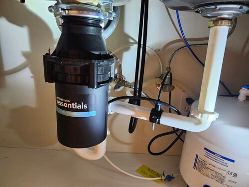 New garbage disposal installed under kitchen sink in Pasadena, California