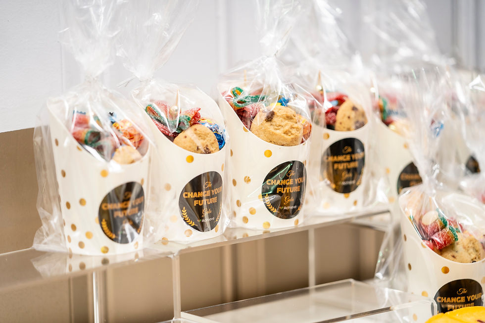 Cookies in cups with Change Your Future labels, food gifts presented nicely.