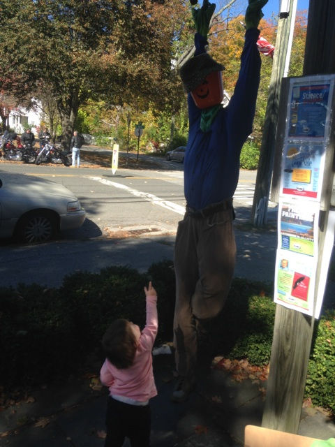 L pointing to pumpkinhead.jpg