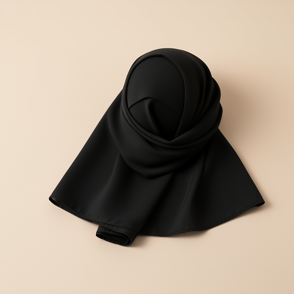 Black hijab folded on a beige background