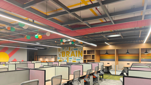 Modern office with an integrated HVAC system, featuring ceiling air vents and efficient airflow distribution for comfort and productivity.