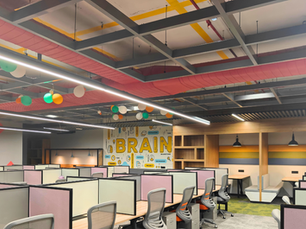 Modern office with an integrated HVAC system, featuring ceiling air vents and efficient airflow distribution for comfort and productivity.