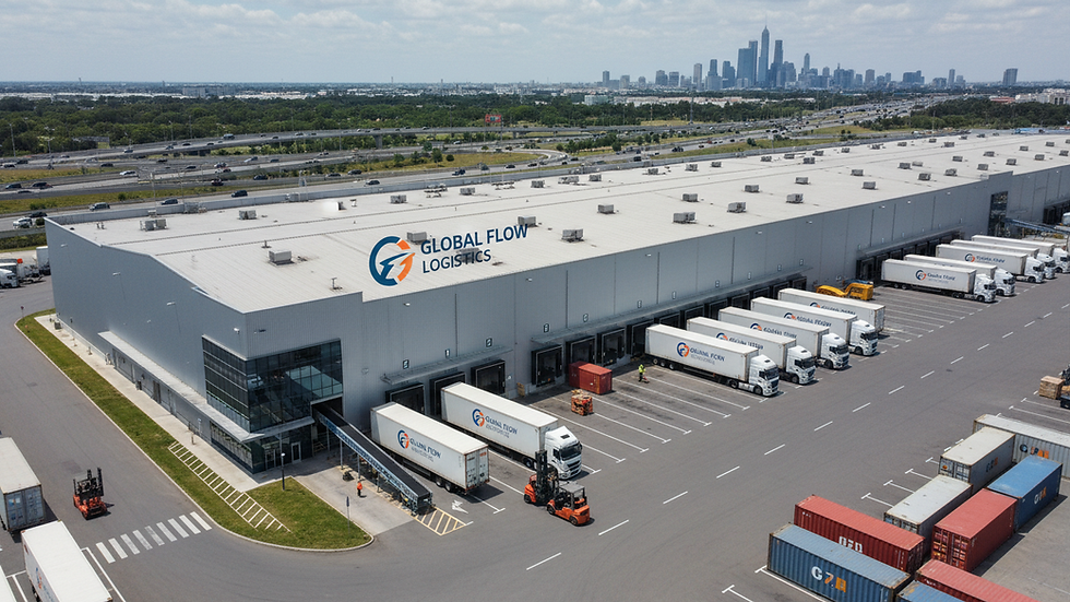 High angle view of a logistics warehouse with trucks being loaded