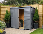 grey apex shedwith horizontal boards in a modern garden.jpg