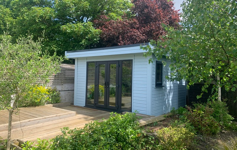 Garden room painted light blue