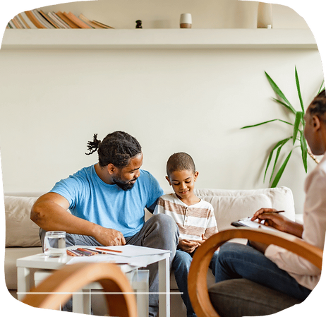 Family engaging in a therapy session__edited.png