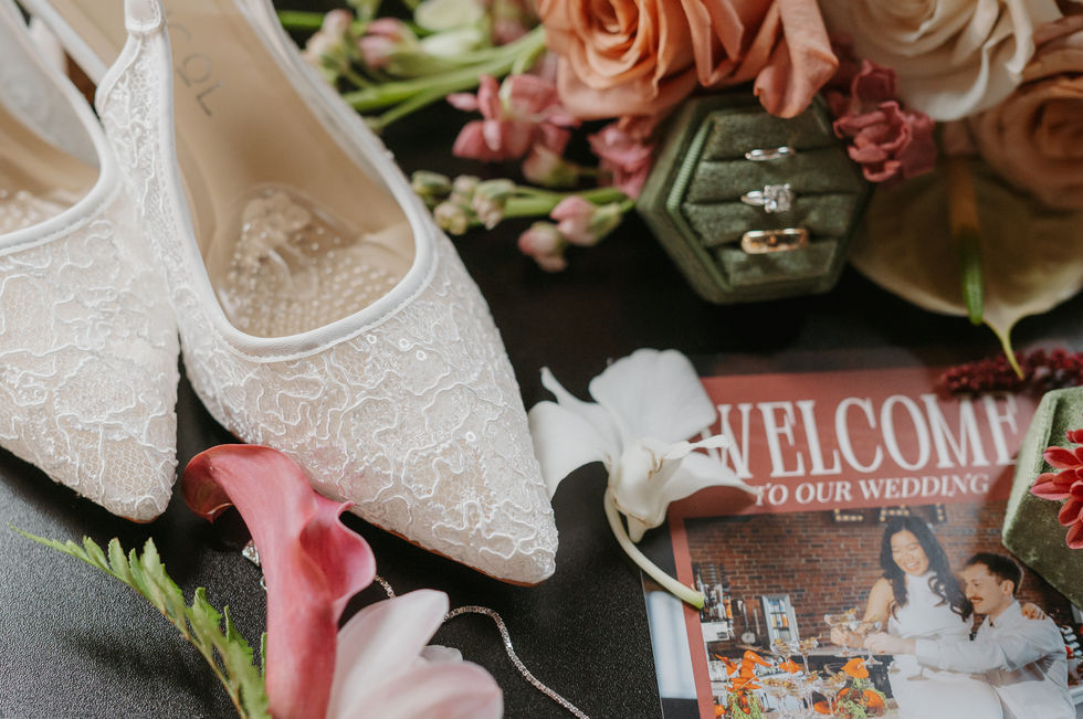 Bridal shoes, wedding rings, flowers and stationery from an Edmonton Pendennis Building wedding.