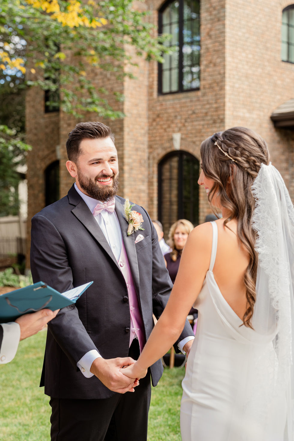 Bride and groom together before their backyard wedding ceremony in Edmonton, Alberta.