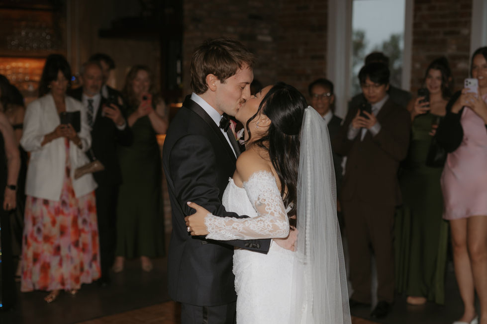 Bride and groom sharing their first dance at the Pendennis Building in Edmonton.