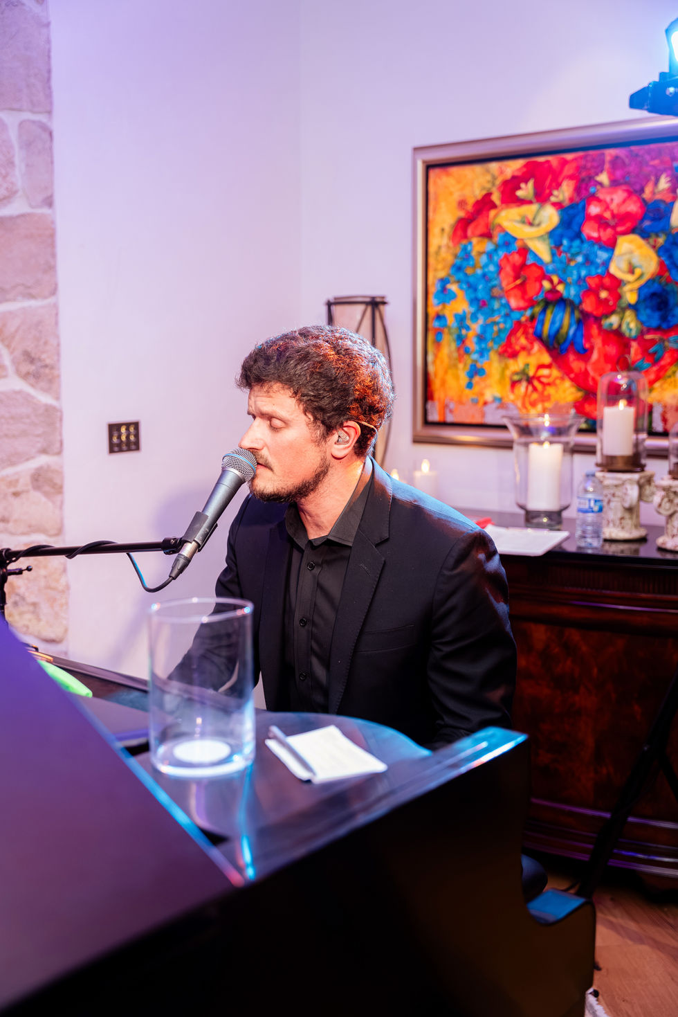 Live pianist performing during an intimate backyard wedding reception in Edmonton, Alberta.