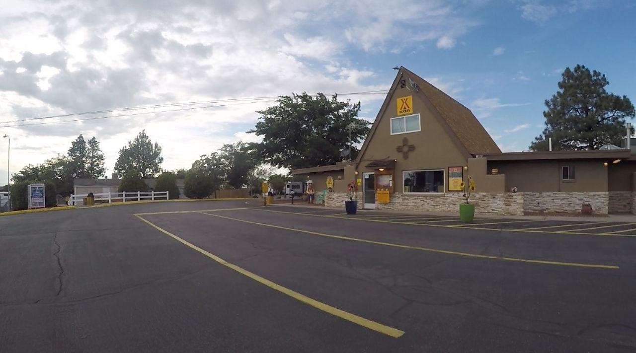 albuquerque KOA campground campground office.  building has a frame middle with one story wings on either side