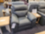 Caravaggio powered recliner in grey leather with pillow back and cushioned arms