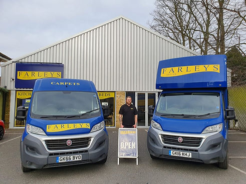 Outside Farleys furniture store in Ramsgate, featuring Farleys company vans.