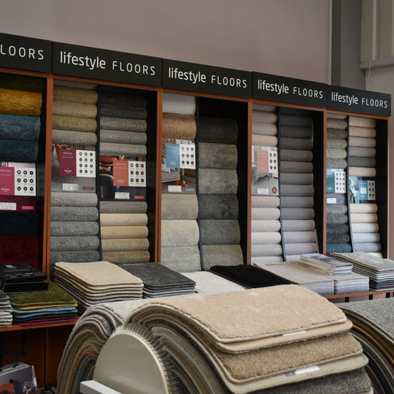 Inside Farleys furniture store, Ramsgate. Lifestyle floors carpet display.