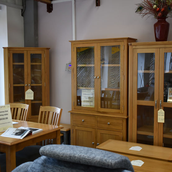 Inside Farleys furniture store, Ramsgate. Solid oak display cabinets and dining sets