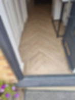 Entryway parquet herringbone LVT flooring