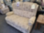 Sherborne Upholstery, stylish monochromatic neutral floral print sofa with pillow back from side view.