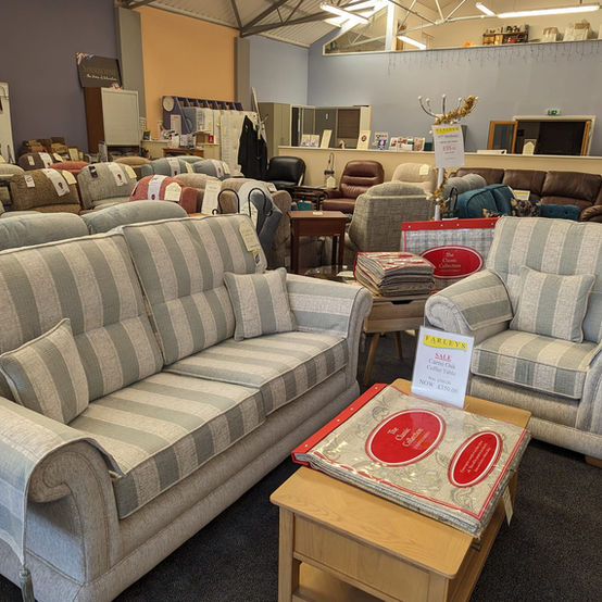 Inside Farleys furniture store, Ramsgate. Upholstered striped sofa set