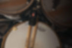 Snare Mic in between two tom drums owned by Paul Bostaph.