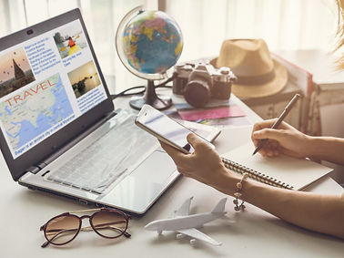Young woman planning vacation trip and searching information or booking an hotel on a smar