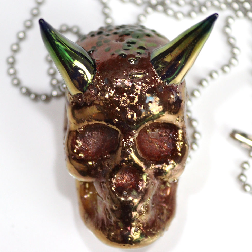 Thumbnail: 24K gold fumed skull pendant