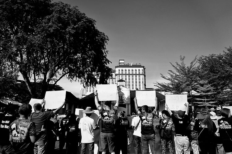 people-street-by-trees-against-sky.jpg
