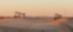 pump jacks in the West Texas sand.jpg