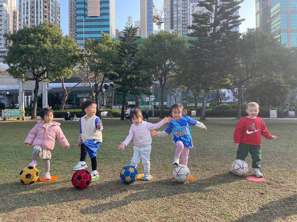 Eye-level view of a colorful sports field with children playing
