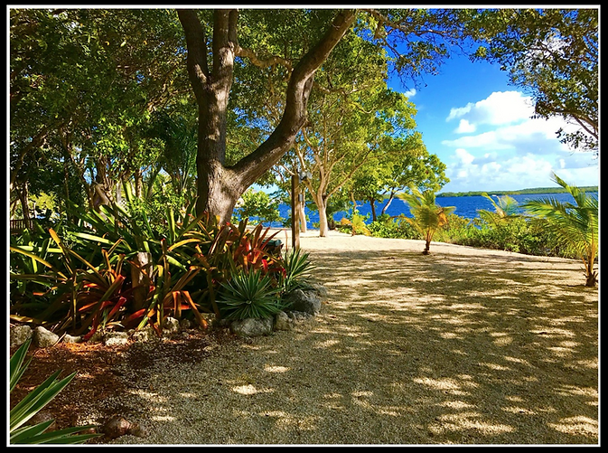 View of Garden and Water at Historic Shadow Point