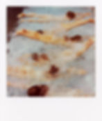 a Polaroid image of a group of women diving into a pool