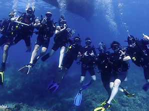 Underwater team exercise during IDC confined water session