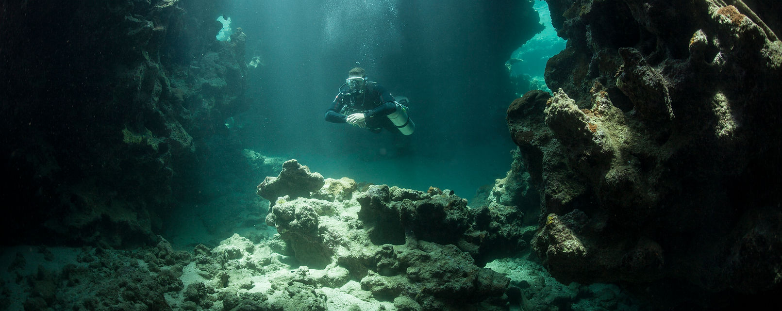 Trimix Technical diver in a cave thailand