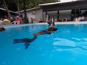 Andre Turcotte giving instructor feedback during pool workshop