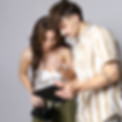 Man and woman looking at social media on tablet