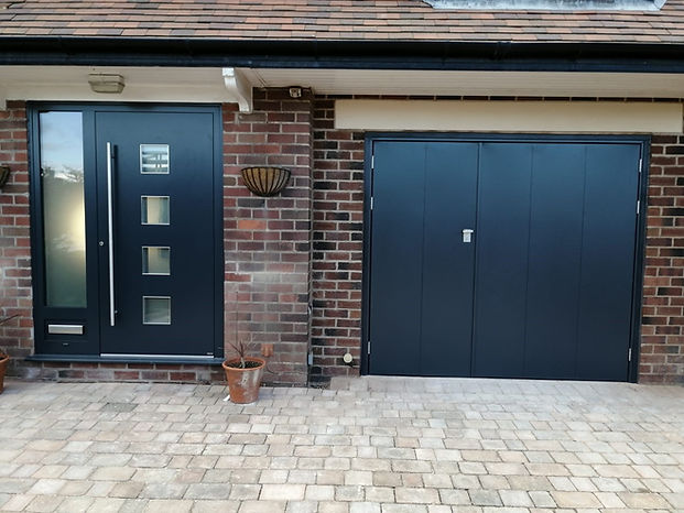 Side hinged garage doors installed on residential garage in Lancashire