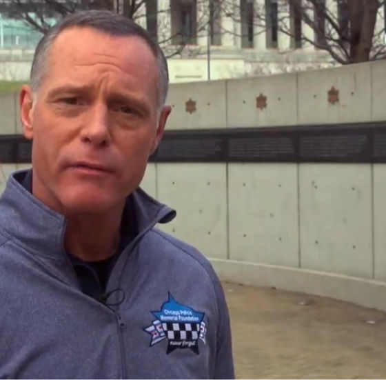 Sargent Hank Voight stands solemnly in front of the Law Enforcement Memorial Wall in the City of Chicago.