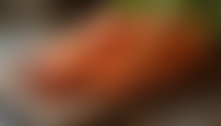 Roasted root vegetables including sweet potatoes, carrots, and beets, perfect for November meals