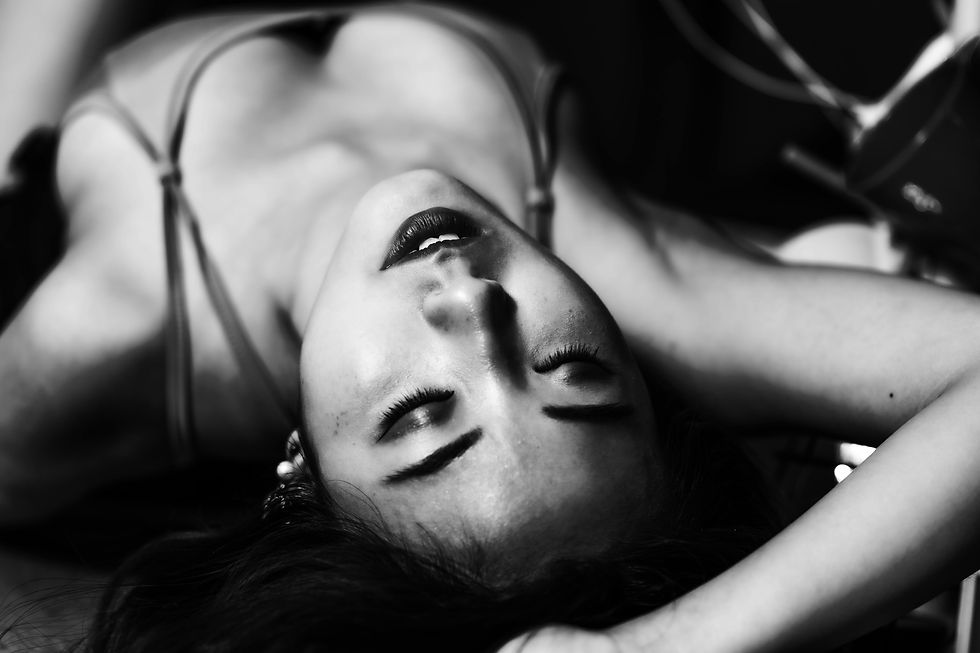 Woman lying on her back having a desirable fantasy