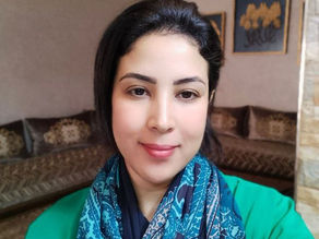 Hassana Rachdi smiles into the camera