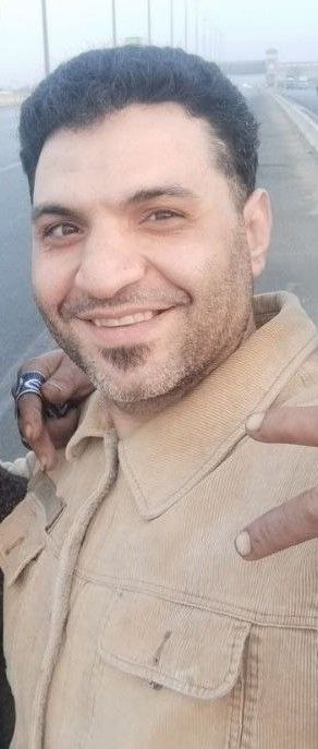 Egyptian AROPL member smiles in the camera